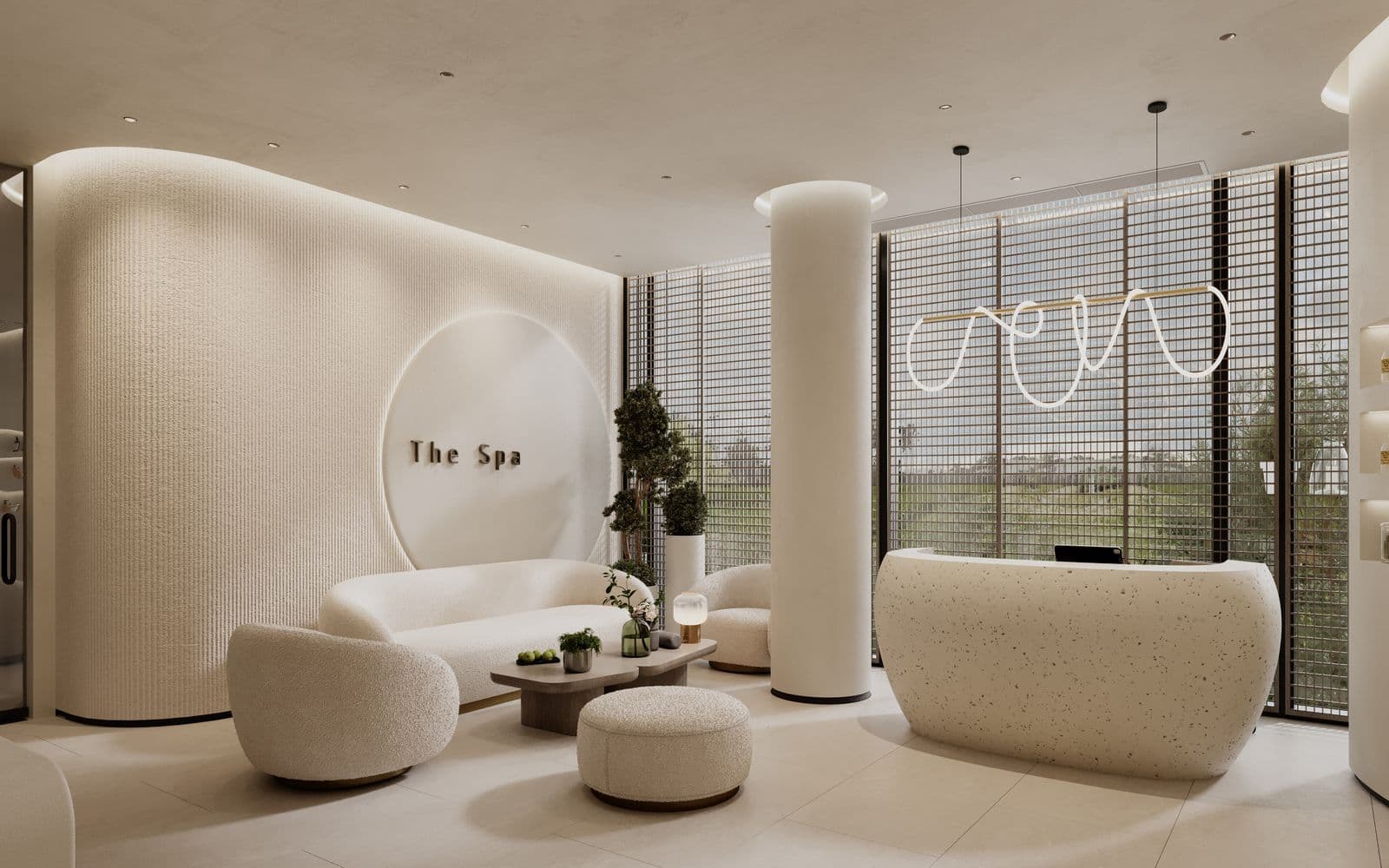 Detail of a cream salon interior — curved boucle chair, stone table and greenery