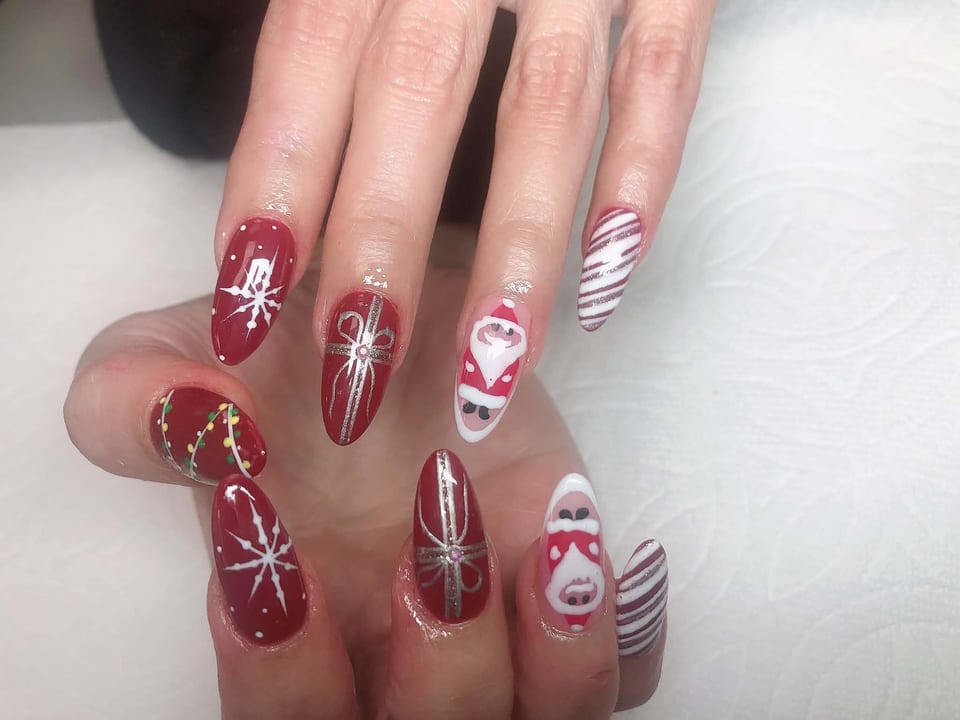 Seasonal holiday nail art at UME Beauty Nails Spa