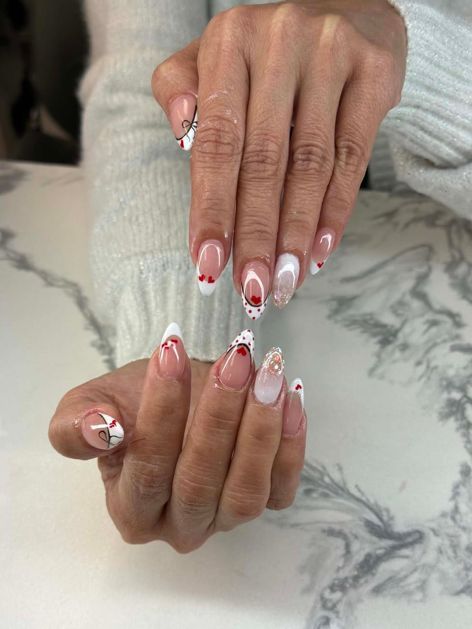 Nails with crystals and glitter at UME Beauty Nails Spa