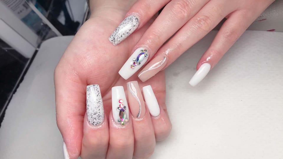 Nails with crystals and glitter at UME Beauty Nails Spa
