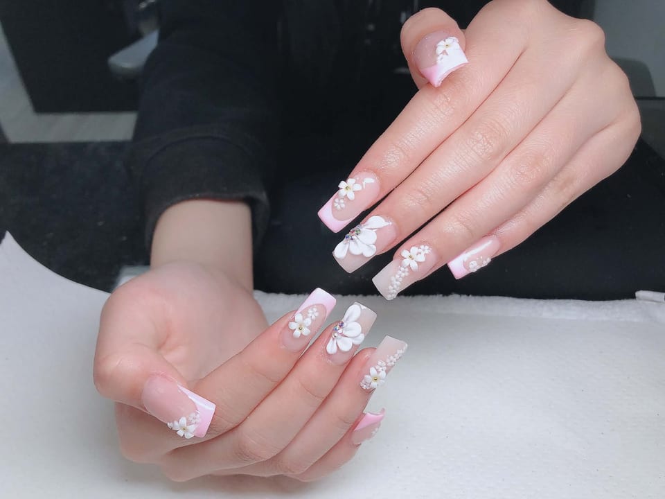 Nails with crystals and glitter at UME Beauty Nails Spa