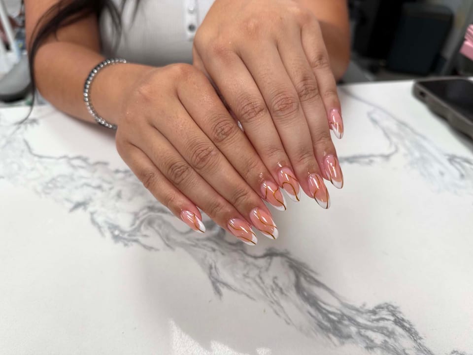 Nails with crystals and glitter at UME Beauty Nails Spa