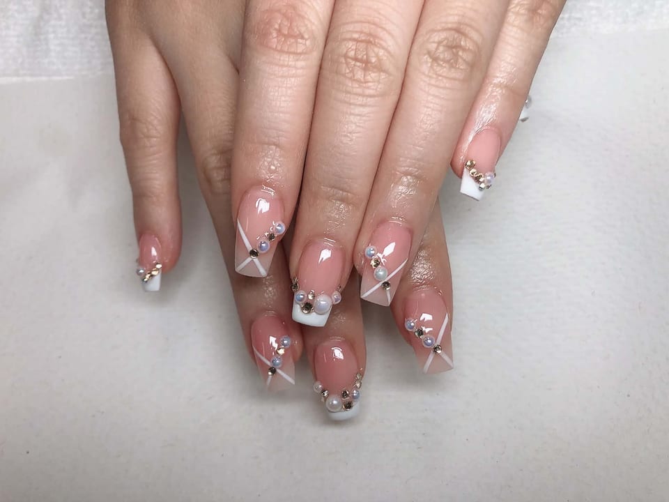 Nails with crystals and glitter at UME Beauty Nails Spa