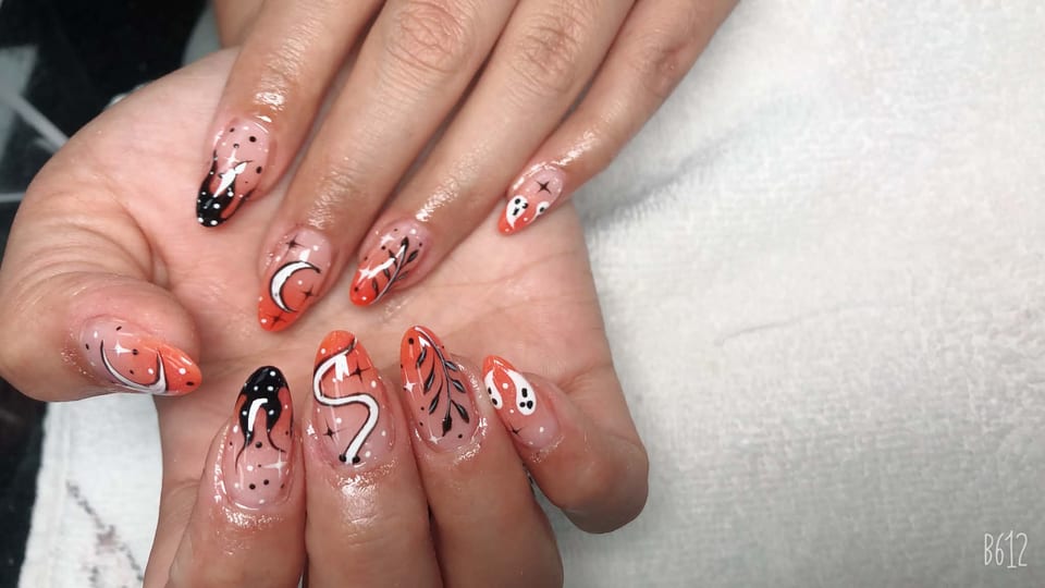 Hand-painted nail art at UME Beauty Nails Spa