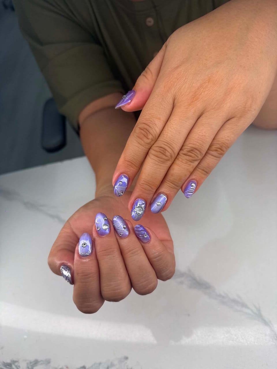 Hand-painted nail art at UME Beauty Nails Spa