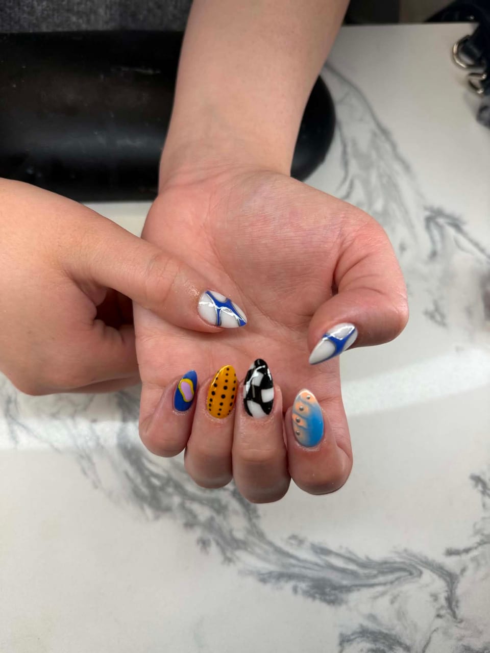 Hand-painted nail art at UME Beauty Nails Spa