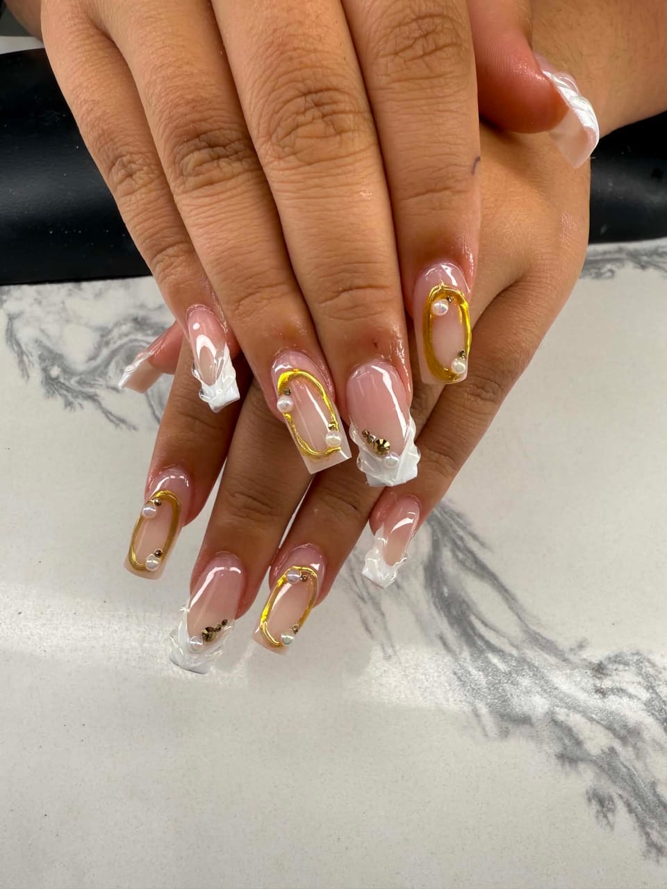 Nails with crystals and glitter at UME Beauty Nails Spa