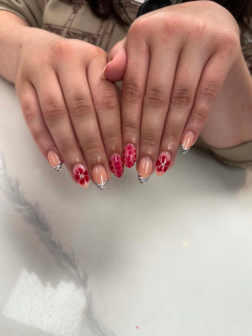 Nails with crystals and glitter at UME Beauty Nails Spa